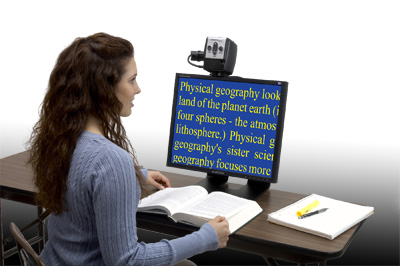 Low Vision - Low Vision student using the acrobat low vision magnifier